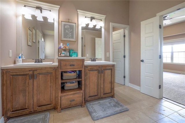 10111 N Tullis Dr, Kansas City, MO 64157 - bathroom featuring tile patterned flooring, vanity, and baseboards