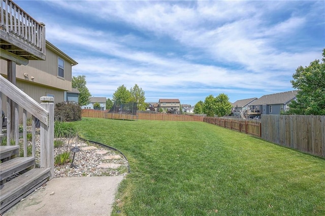 10111 N Tullis Dr, Kansas City, MO 64157 - view of yard with a trampoline