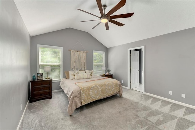 carpeted bedroom with lofted ceiling, baseboards, multiple windows, and ceiling fan