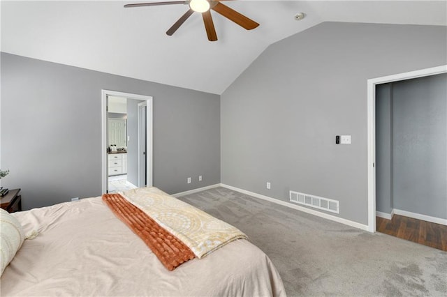 bedroom featuring vaulted ceiling, carpet, baseboards, and ceiling fan