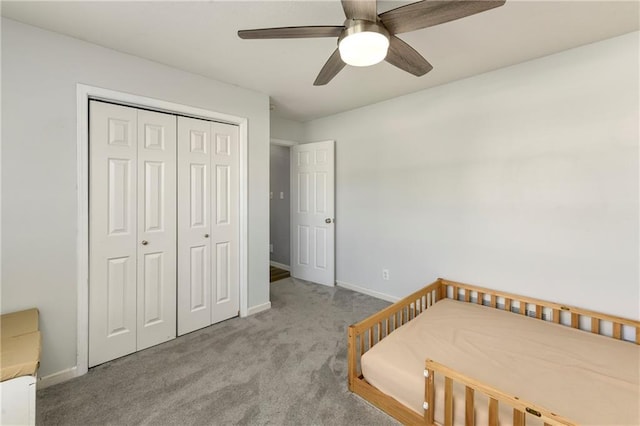 bedroom featuring carpet, baseboards, a closet, and a ceiling fan