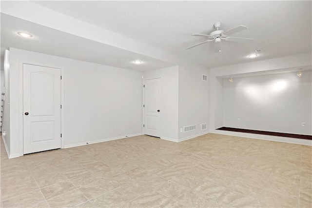 spare room with ceiling fan, recessed lighting, and baseboards