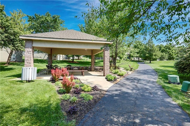 view of community with a gazebo and a lawn