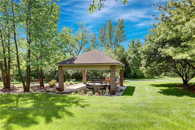 view of green lawn with a gazebo