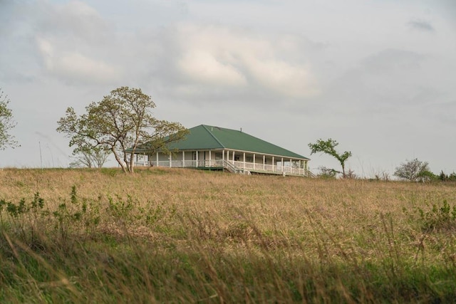 23249 NW Mitchell Rd, Garnett, KS 66032 - view of yard featuring covered porch