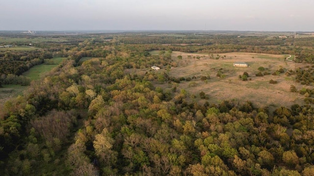 23249 NW Mitchell Rd, Garnett, KS 66032 - aerial view of property's location with a heavily wooded area