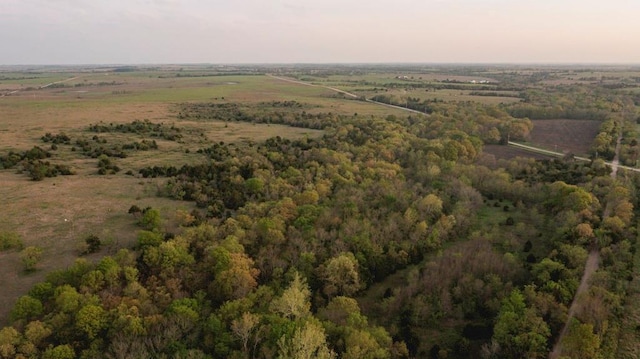 23249 NW Mitchell Rd, Garnett, KS 66032 - aerial view of property's location featuring a heavily wooded area