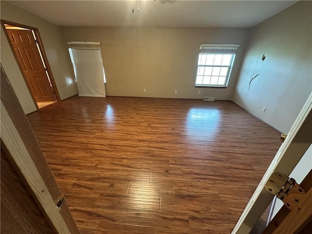 23249 NW Mitchell Rd, Garnett, KS 66032 - spare room featuring wood finished floors