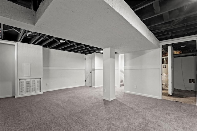 13300 Palmer Ave, Grandview, MO 64030 - finished below grade area with carpet flooring and water heater