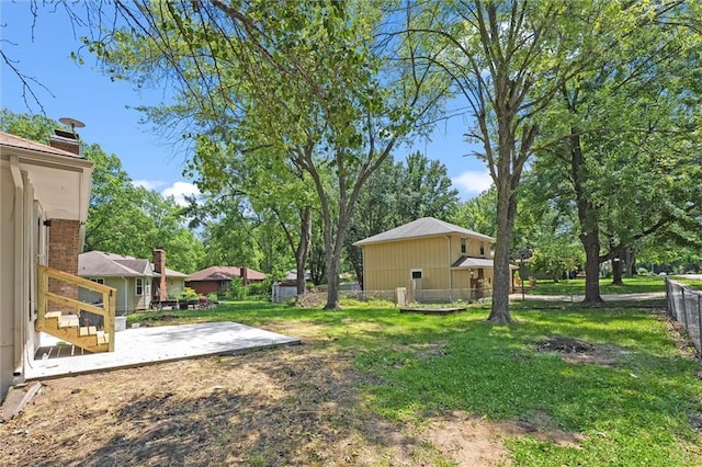 13300 Palmer Ave, Grandview, MO 64030 - view of yard with a patio
