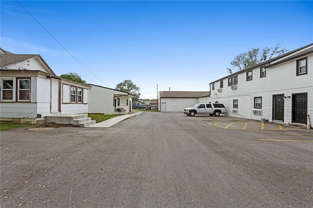 view of asphalt road featuring a residential view