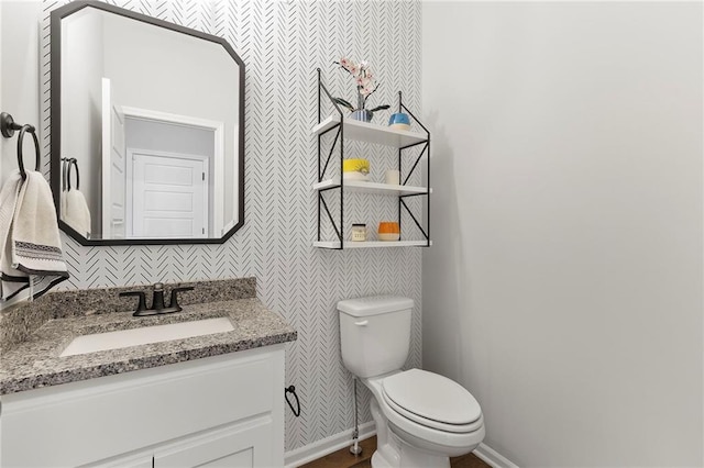 16780 W 170th Ct, Olathe, KS 66062 - bathroom with wallpapered walls, baseboards, vanity, and toilet