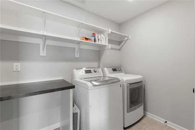 16780 W 170th Ct, Olathe, KS 66062 - washroom featuring independent washer and dryer, baseboards, and light tile patterned floors