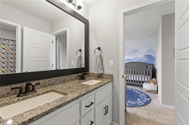 16780 W 170th Ct, Olathe, KS 66062 - full bath featuring double vanity, connected bathroom, and baseboards