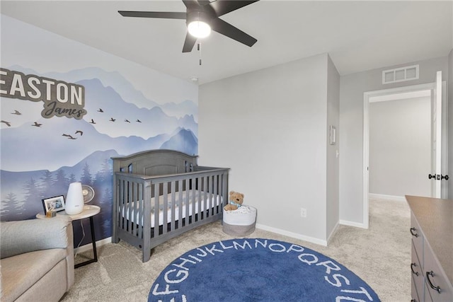 16780 W 170th Ct, Olathe, KS 66062 - carpeted bedroom featuring baseboards, a crib, and ceiling fan