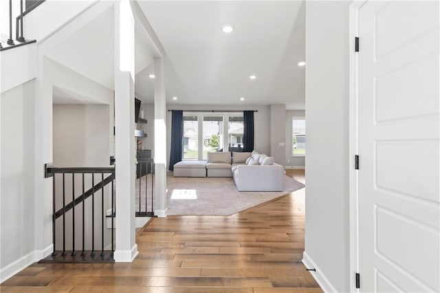 16780 W 170th Ct, Olathe, KS 66062 - corridor featuring wood finished floors, recessed lighting, baseboards, and stairway