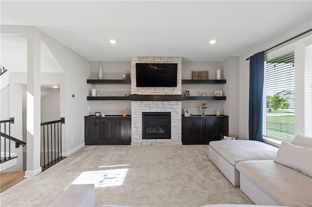 16780 W 170th Ct, Olathe, KS 66062 - carpeted living room with healthy amount of natural light, a fireplace, recessed lighting, and baseboards