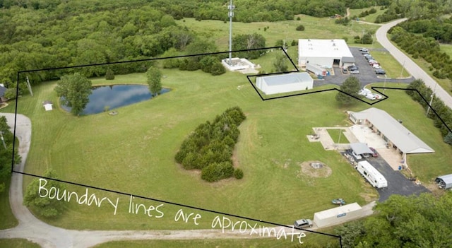 12100 Hedge Lane Ter, Olathe, KS 66061 - view of property location with property boundaries highlighted, a nearby body of water, and a heavily wooded area