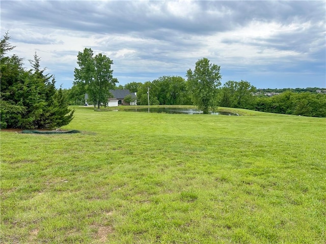 12100 Hedge Lane Ter, Olathe, KS 66061 - view of green lawn with a water view