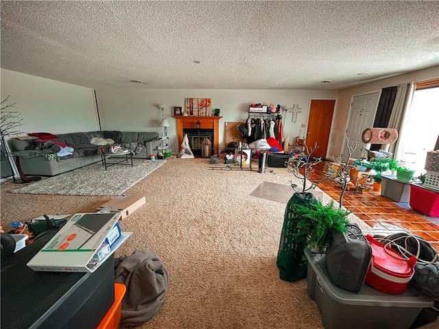12100 Hedge Lane Ter, Olathe, KS 66061 - living area with a textured ceiling and a fireplace