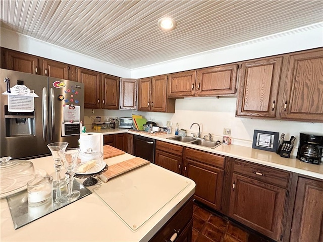 12100 Hedge Lane Ter, Olathe, KS 66061 - kitchen featuring a sink, stainless steel fridge, dishwashing machine, and light countertops