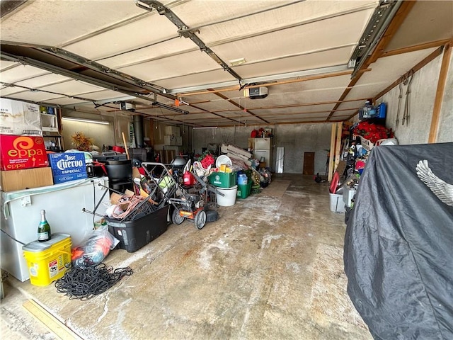 12100 Hedge Lane Ter, Olathe, KS 66061 - garage with a garage door opener