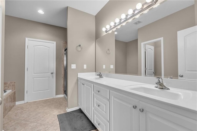 21923 W 116th Pl, Olathe, KS 66061 - bathroom featuring double vanity, tile patterned floors, a bath, a shower with shower door, and baseboards