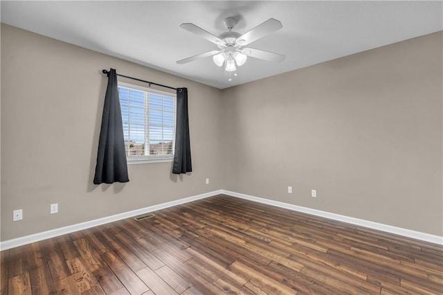 21923 W 116th Pl, Olathe, KS 66061 - unfurnished room featuring dark wood-type flooring, baseboards, and a ceiling fan