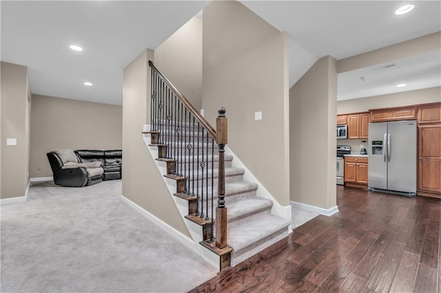 21923 W 116th Pl, Olathe, KS 66061 - staircase featuring recessed lighting, baseboards, and wood finished floors