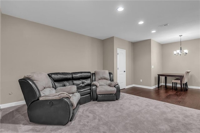21923 W 116th Pl, Olathe, KS 66061 - living room featuring dark carpet, a chandelier, baseboards, recessed lighting, and dark wood-style floors