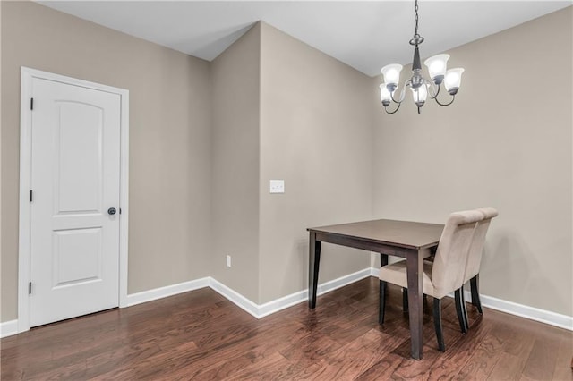 21923 W 116th Pl, Olathe, KS 66061 - dining room with a chandelier, wood finished floors, and baseboards