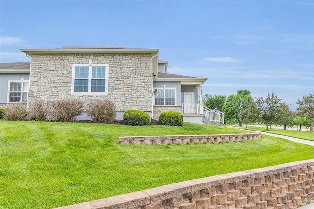 21923 W 116th Pl, Olathe, KS 66061 - view of front of property featuring stone siding, a front lawn, and stucco siding