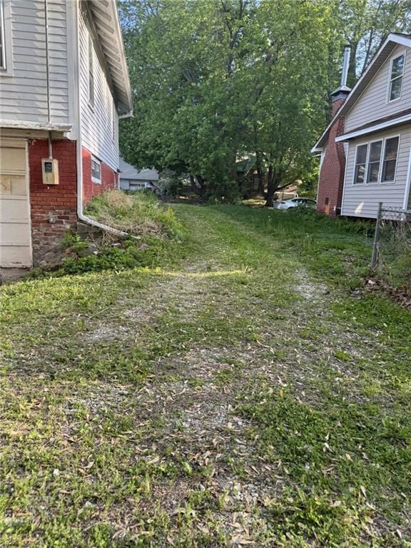 view of yard featuring a garage