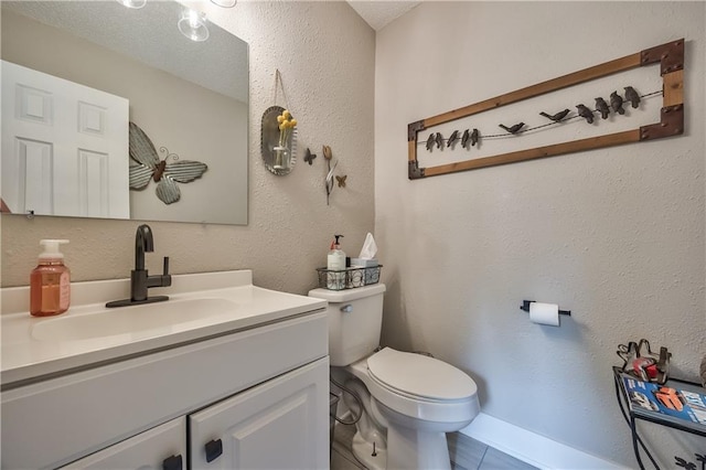 12735 W 108th Pl, Overland Park, KS 66210 - bathroom featuring toilet, vanity, and tile patterned floors