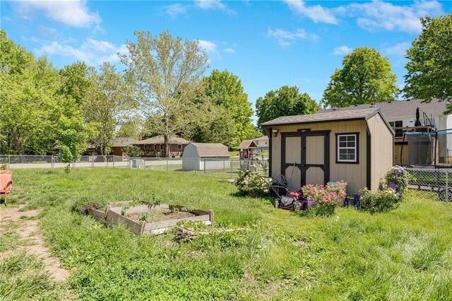 603 W 30th St, Higginsville, MO 64037 - view of yard with a garden