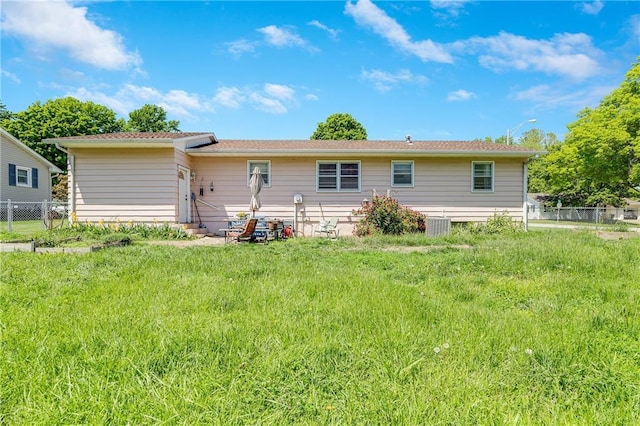 603 W 30th St, Higginsville, MO 64037 - rear view of house featuring entry steps