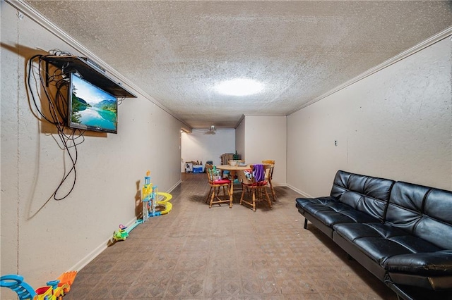 603 W 30th St, Higginsville, MO 64037 - playroom featuring ornamental molding, a textured ceiling, tile patterned floors, and baseboards