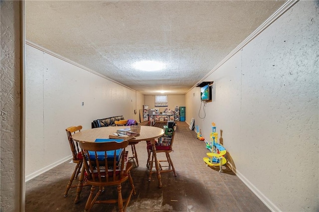 603 W 30th St, Higginsville, MO 64037 - dining space with a textured ceiling, ornamental molding, and baseboards