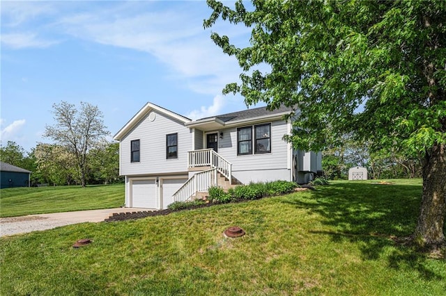 ranch-style home featuring driveway, a garage, a front yard, and a shed