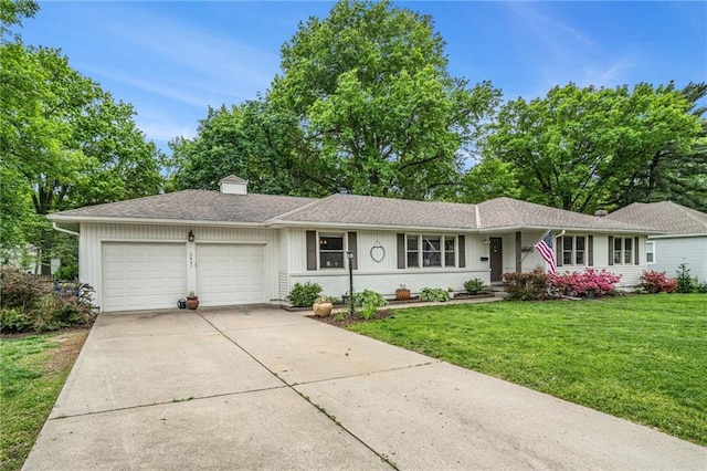 ranch-style house with a garage, a front yard, concrete driveway, and a chimney