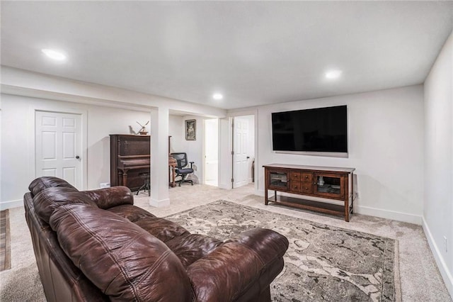 living area featuring carpet floors, baseboards, and recessed lighting