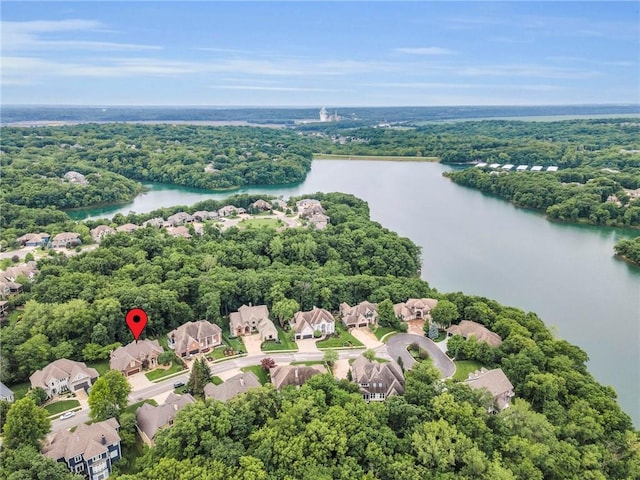 8129 Clearwater Pt, Parkville, MO 64152 - aerial view of residential area with a nearby body of water