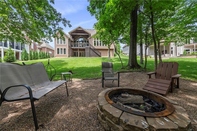 8129 Clearwater Pt, Parkville, MO 64152 - view of patio / terrace with a fire pit and stairs