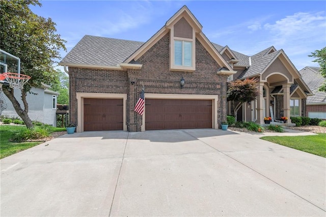 8129 Clearwater Pt, Parkville, MO 64152 - traditional-style house with brick siding and driveway