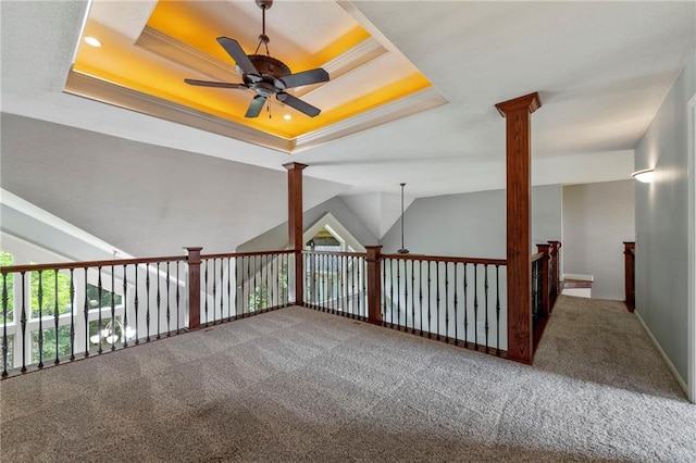 8129 Clearwater Pt, Parkville, MO 64152 - spare room with ceiling fan, ornate columns, a tray ceiling, and recessed lighting