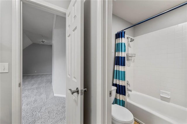8129 Clearwater Pt, Parkville, MO 64152 - bathroom featuring shower / bath combo with shower curtain and lofted ceiling