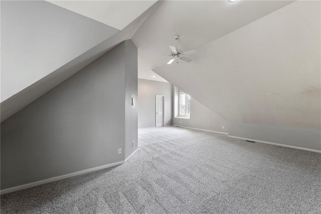 8129 Clearwater Pt, Parkville, MO 64152 - additional living space featuring lofted ceiling, ceiling fan, and carpet floors
