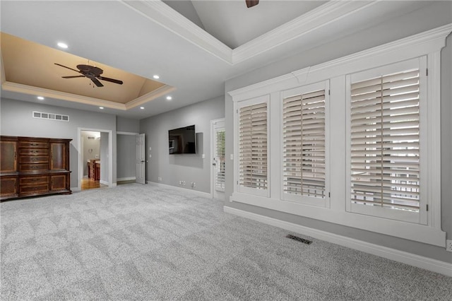 8129 Clearwater Pt, Parkville, MO 64152 - unfurnished living room featuring ceiling fan, a raised ceiling, carpet flooring, crown molding, and recessed lighting