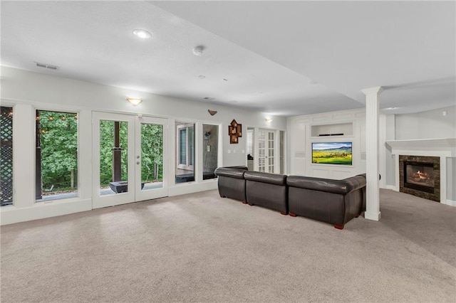 8129 Clearwater Pt, Parkville, MO 64152 - living area featuring carpet, a fireplace, and recessed lighting