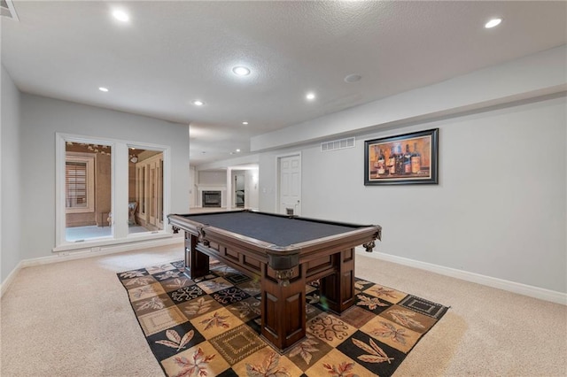 8129 Clearwater Pt, Parkville, MO 64152 - playroom featuring light colored carpet, billiards table, recessed lighting, and a textured ceiling